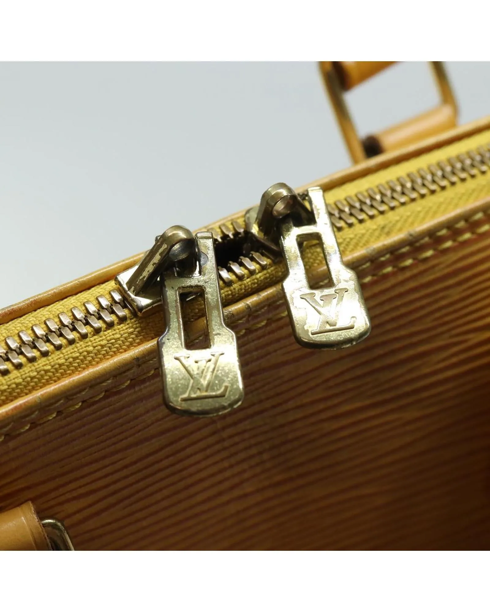 Epi Leather Alma Hand Bag with Distinctive Textured Finish