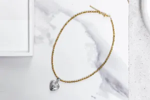 Gold hemate and heart locker